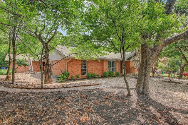 12333 Blue Water Dr, Austin, TX 78758 - view of front facade with brick siding
