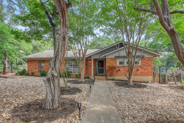 12333 Blue Water Dr, Austin, TX 78758 - view of front of property featuring brick siding and board and batten siding