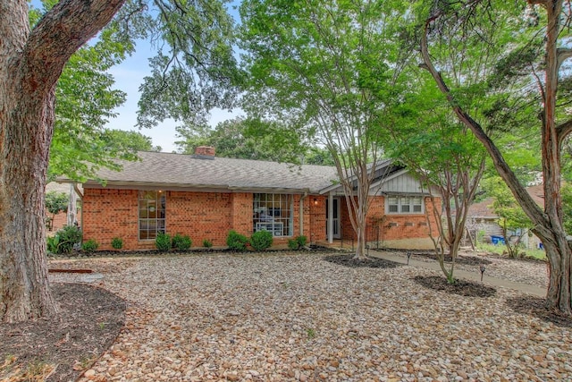 12333 Blue Water Dr, Austin, TX 78758 - ranch-style house featuring brick siding, a chimney, and a shingled roof