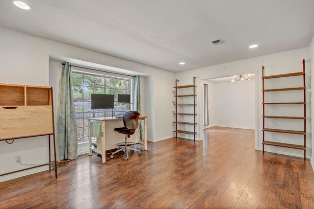 12333 Blue Water Dr, Austin, TX 78758 - home office with wood finished floors, recessed lighting, and baseboards