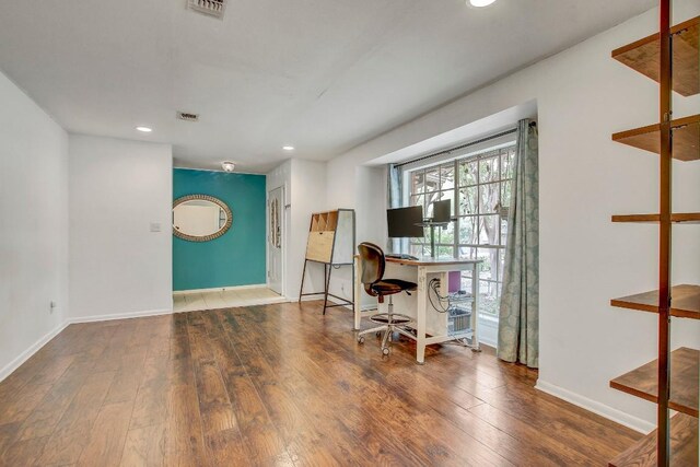 12333 Blue Water Dr, Austin, TX 78758 - home office with hardwood / wood-style flooring, recessed lighting, and baseboards