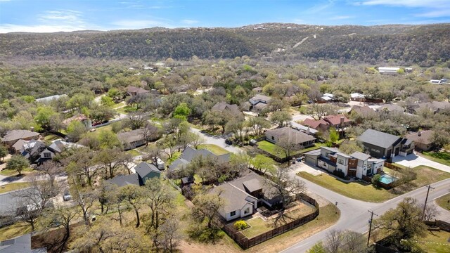 1017 S Quinlan Park Rd, Austin, TX 78732 - aerial perspective of suburban area featuring a mountain backdrop