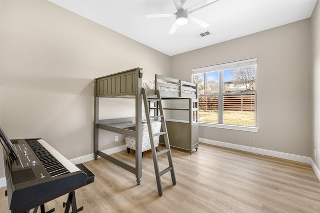 1017 S Quinlan Park Rd, Austin, TX 78732 - bedroom featuring light wood-style floors and a ceiling fan