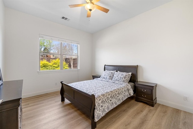 1017 S Quinlan Park Rd, Austin, TX 78732 - bedroom featuring light wood-type flooring and ceiling fan
