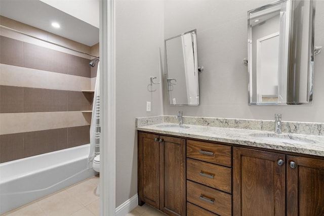 1017 S Quinlan Park Rd, Austin, TX 78732 - bathroom with double vanity, tile patterned floors, and shower / tub combination