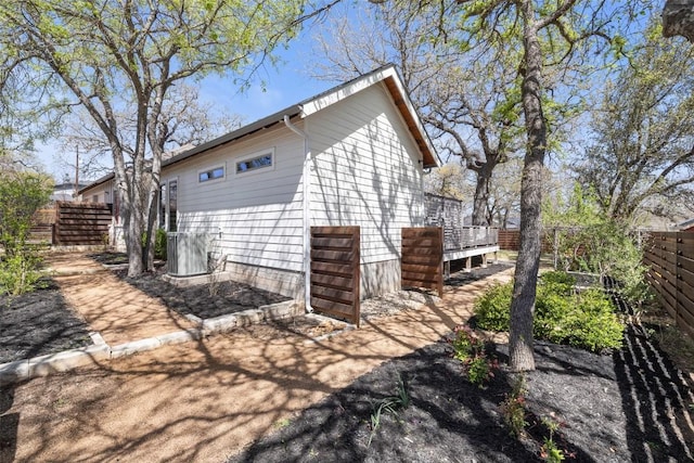 1017 S Quinlan Park Rd, Austin, TX 78732 - view of home's exterior featuring a fenced backyard