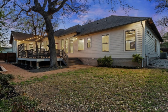 1017 S Quinlan Park Rd, Austin, TX 78732 - rear view of property featuring a wooden deck, a lawn, and a shingled roof
