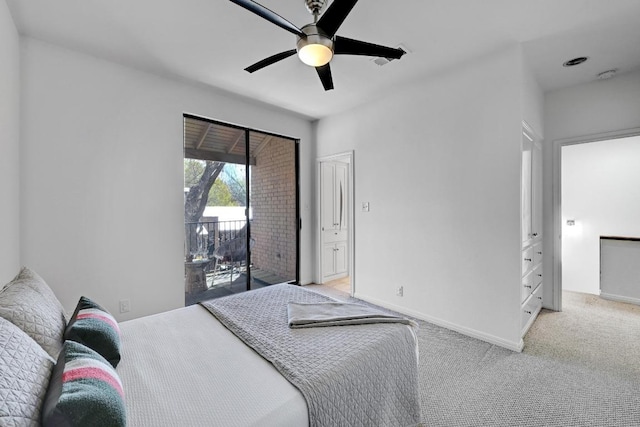 611 E 45th St Unit 15, Austin, TX 78751 - bedroom featuring access to outside, light carpet, and a ceiling fan