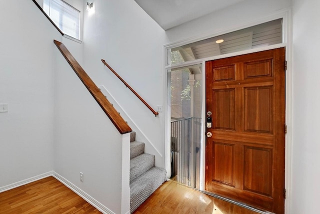611 E 45th St Unit 15, Austin, TX 78751 - entrance foyer with wood finished floors and stairs