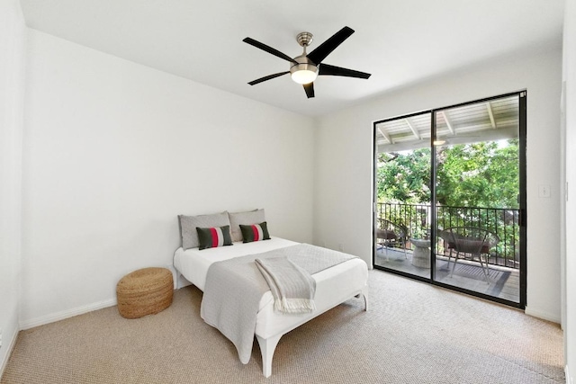 611 E 45th St Unit 15, Austin, TX 78751 - bedroom with carpet flooring, access to outside, and ceiling fan