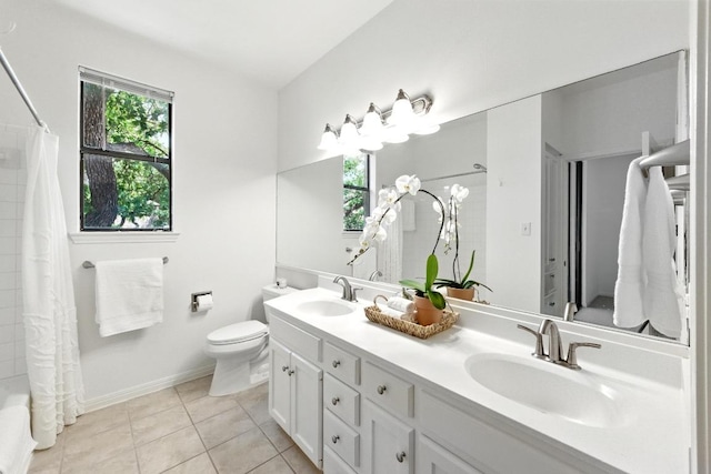 611 E 45th St Unit 15, Austin, TX 78751 - full bath with double vanity, a shower with shower curtain, and tile patterned flooring