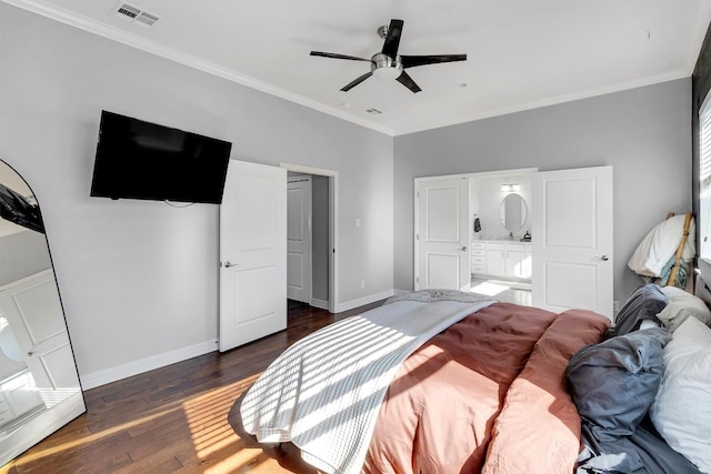 22113 Shotts Dr, Spicewood, TX 78669 - bedroom featuring dark wood-style flooring, crown molding, baseboards, connected bathroom, and a ceiling fan