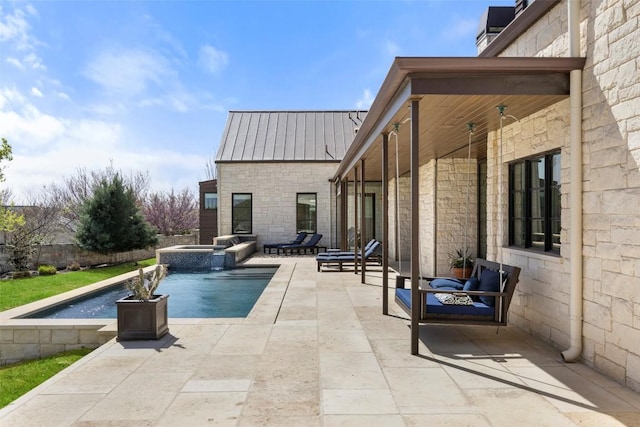 599 Vendemmia Bnd, Austin, TX 78738 - view of pool featuring a patio area and a pool with connected hot tub