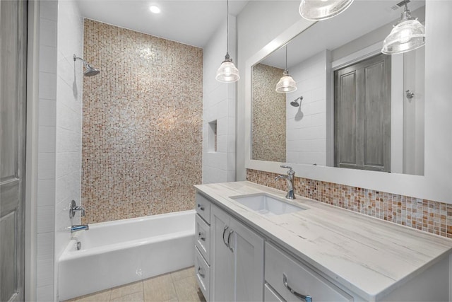 599 Vendemmia Bnd, Austin, TX 78738 - full bathroom with vanity, shower / bath combination, backsplash, and recessed lighting