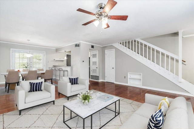 806 Castle Ridge Rd Unit B, Austin, TX 78746 - living room featuring wood finished floors, stairs, ceiling fan, ornamental molding, and baseboards