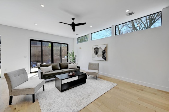 2109 Glendale Pl, Austin, TX 78704 - living area featuring recessed lighting, a ceiling fan, baseboards, and wood finished floors