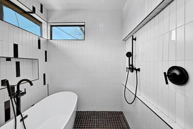 2109 Glendale Pl, Austin, TX 78704 - full bath featuring tile walls, a soaking tub, tiled shower, and tile patterned flooring