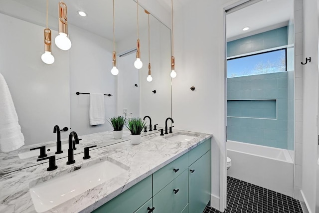 2109 Glendale Pl, Austin, TX 78704 - full bathroom featuring double vanity, toilet, tub / shower combination, tile patterned flooring, and recessed lighting