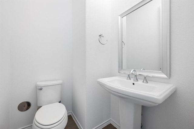 19604 Summit Glory Trl, Spicewood, TX 78669 - bathroom with toilet and baseboards