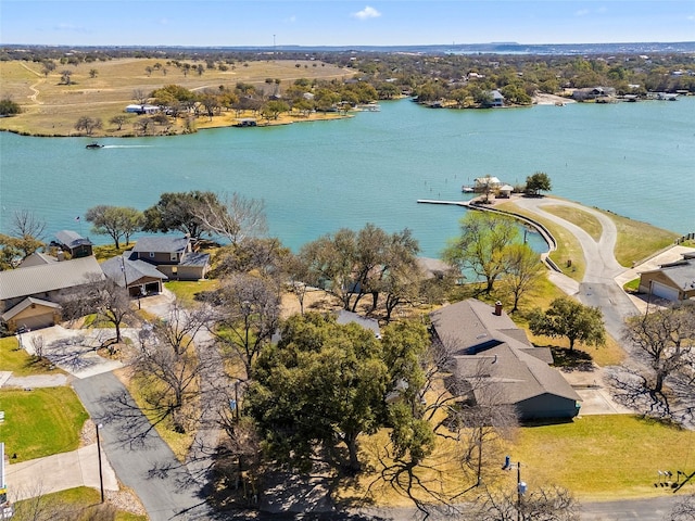300 E Heron Dr, Marble Falls, TX 78654 - aerial overview of property's location with a large body of water and nearby suburban area