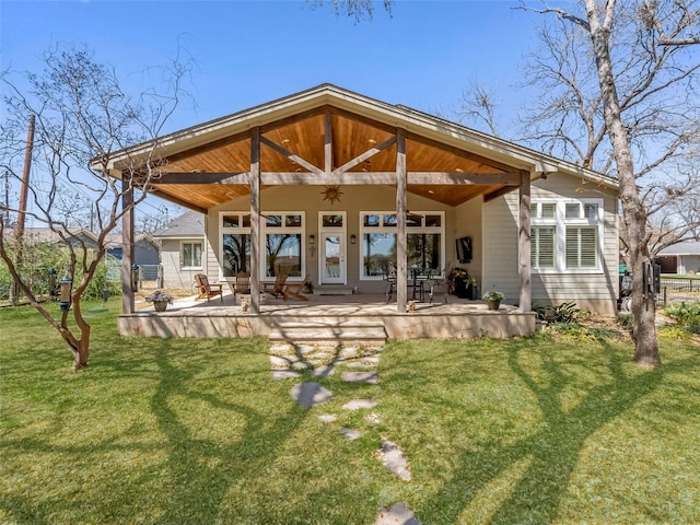 300 E Heron Dr, Marble Falls, TX 78654 - back of house featuring a lawn
