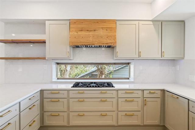 717 Meriden Ln, Austin, TX 78703 - kitchen with black gas cooktop, open shelves, tasteful backsplash, and light countertops