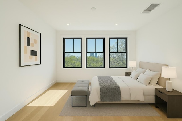717 Meriden Ln, Austin, TX 78703 - bedroom featuring light wood-type flooring, baseboards, and recessed lighting