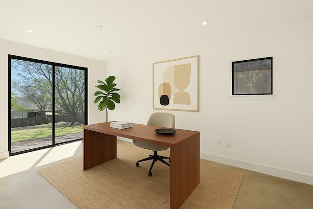717 Meriden Ln, Austin, TX 78703 - office space featuring finished concrete flooring, baseboards, and recessed lighting