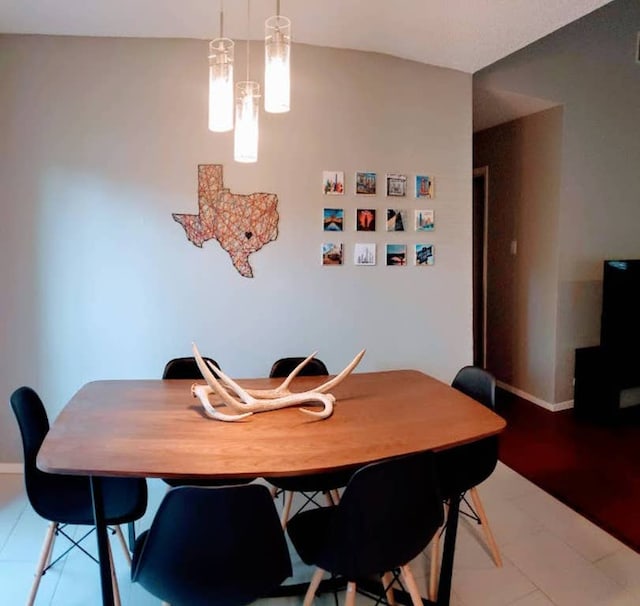 dining room with baseboards