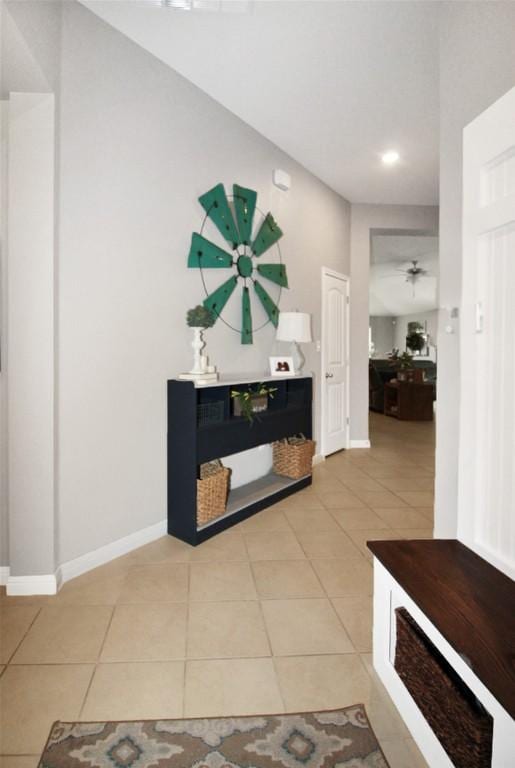 180 Sunshine Ln, Kyle, TX 78640 - hall featuring light tile patterned floors, baseboards, and recessed lighting