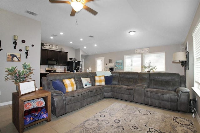 180 Sunshine Ln, Kyle, TX 78640 - living area with ceiling fan, visible vents, light tile patterned floors, lofted ceiling, and recessed lighting