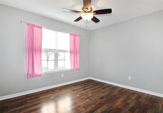 180 Sunshine Ln, Kyle, TX 78640 - unfurnished room featuring baseboards, ceiling fan, and dark wood-type flooring