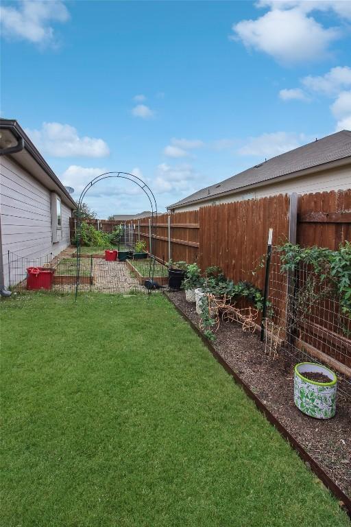 180 Sunshine Ln, Kyle, TX 78640 - view of yard featuring a fenced backyard