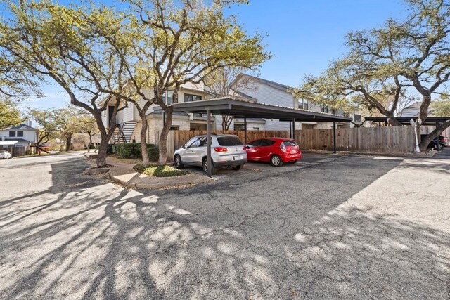 9226 Jollyville Rd Unit 170, Austin, TX 78759 - view of front of home with covered parking and stairway