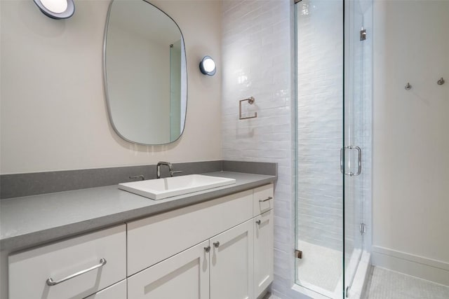 2209 Bowman Ave, Austin, TX 78703 - bathroom featuring vanity, a shower stall, and tile patterned floors