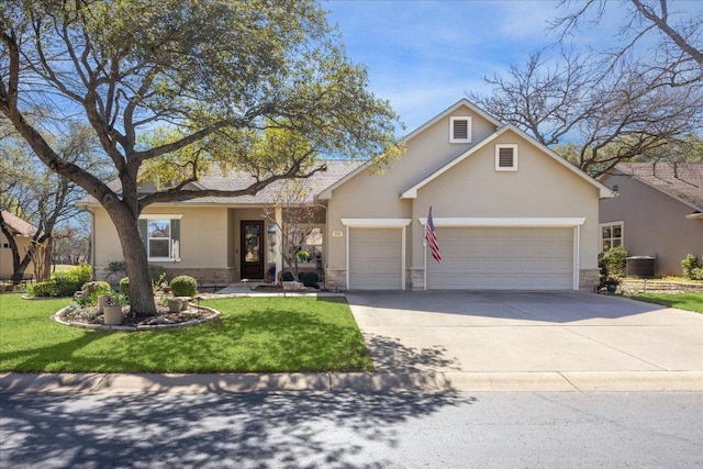 view of front of property with concrete driveway, stucco siding, stone siding, central AC unit, and a garage