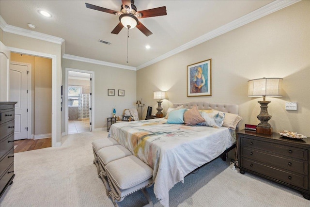 bedroom featuring visible vents, baseboards, crown molding, recessed lighting, and light carpet
