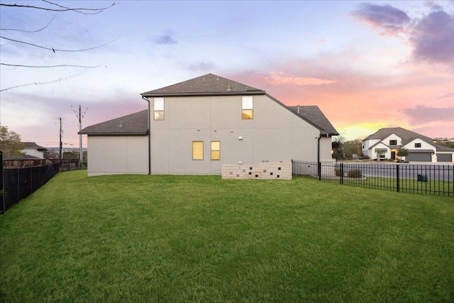 19302 Summit Glory Trl Unit 68, Spicewood, TX 78669 - back of property at dusk with roof with shingles