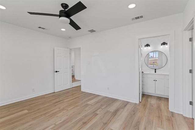 interior space featuring visible vents, recessed lighting, baseboards, and light wood-style floors