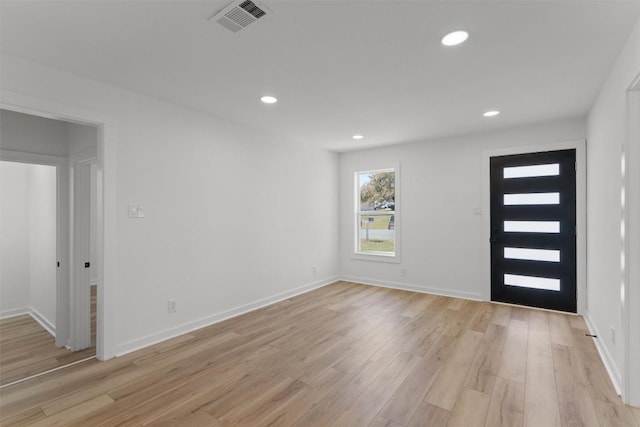 entrance foyer with baseboards, recessed lighting, visible vents, and light wood-type flooring