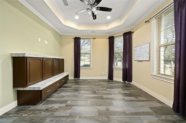2624 University Club Dr, Austin, TX 78732 - interior space featuring baseboards, visible vents, ceiling fan, crown molding, and a raised ceiling