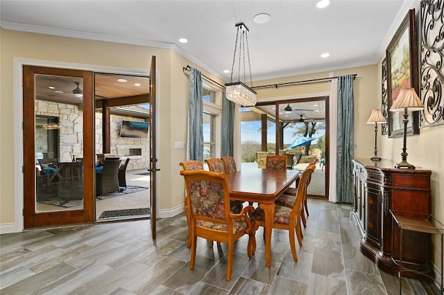 2624 University Club Dr, Austin, TX 78732 - dining space featuring a ceiling fan, recessed lighting, ornamental molding, wood finished floors, and baseboards