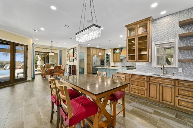 2624 University Club Dr, Austin, TX 78732 - dining space featuring visible vents, ornamental molding, recessed lighting, french doors, and a notable chandelier