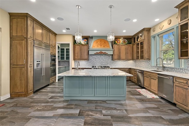 2624 University Club Dr, Austin, TX 78732 - kitchen featuring a sink, an island with sink, premium range hood, and stainless steel appliances