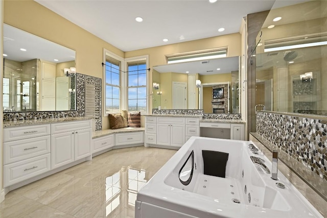 2624 University Club Dr, Austin, TX 78732 - full bath with a shower stall, decorative backsplash, a tub with jets, two vanities, and recessed lighting
