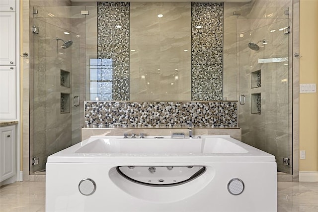 2624 University Club Dr, Austin, TX 78732 - bathroom featuring marble finish floor, a whirlpool tub, and a stall shower