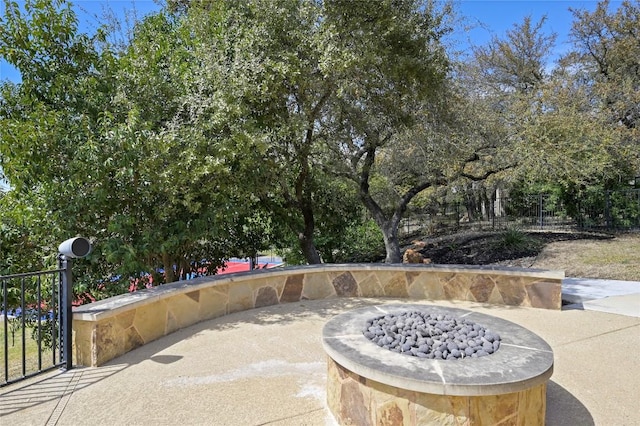 2624 University Club Dr, Austin, TX 78732 - view of patio featuring an outdoor fire pit and fence
