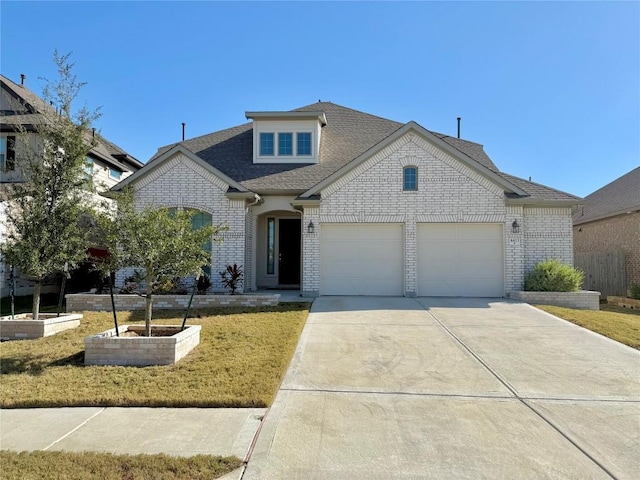 4413 Shady Hill Ln, Pflugerville, TX 78660 - french provincial home featuring a garage, brick siding, driveway, and a shingled roof