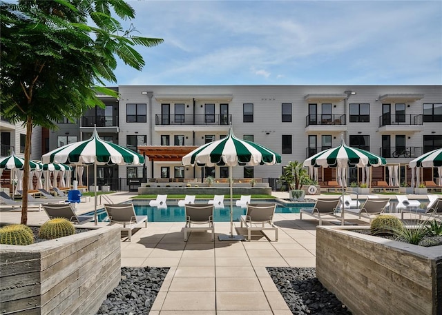 1701 Simond Ave Unit 426, Austin, TX 78723 - community pool featuring a patio