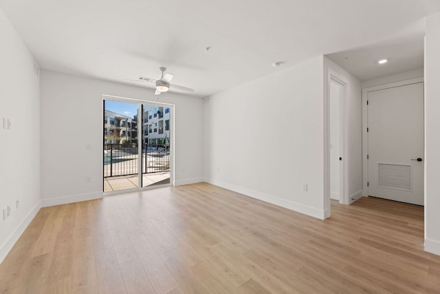 1701 Simond Ave Unit 426, Austin, TX 78723 - unfurnished room featuring light wood finished floors, ceiling fan, baseboards, and recessed lighting